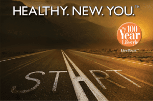 An empty road at sunrise with START painted on the pavement. Text above reads HEALTHY. NEW. YOU. with a logo for The 100 Year Lifestyle and the phrase Live Yours! on the right.