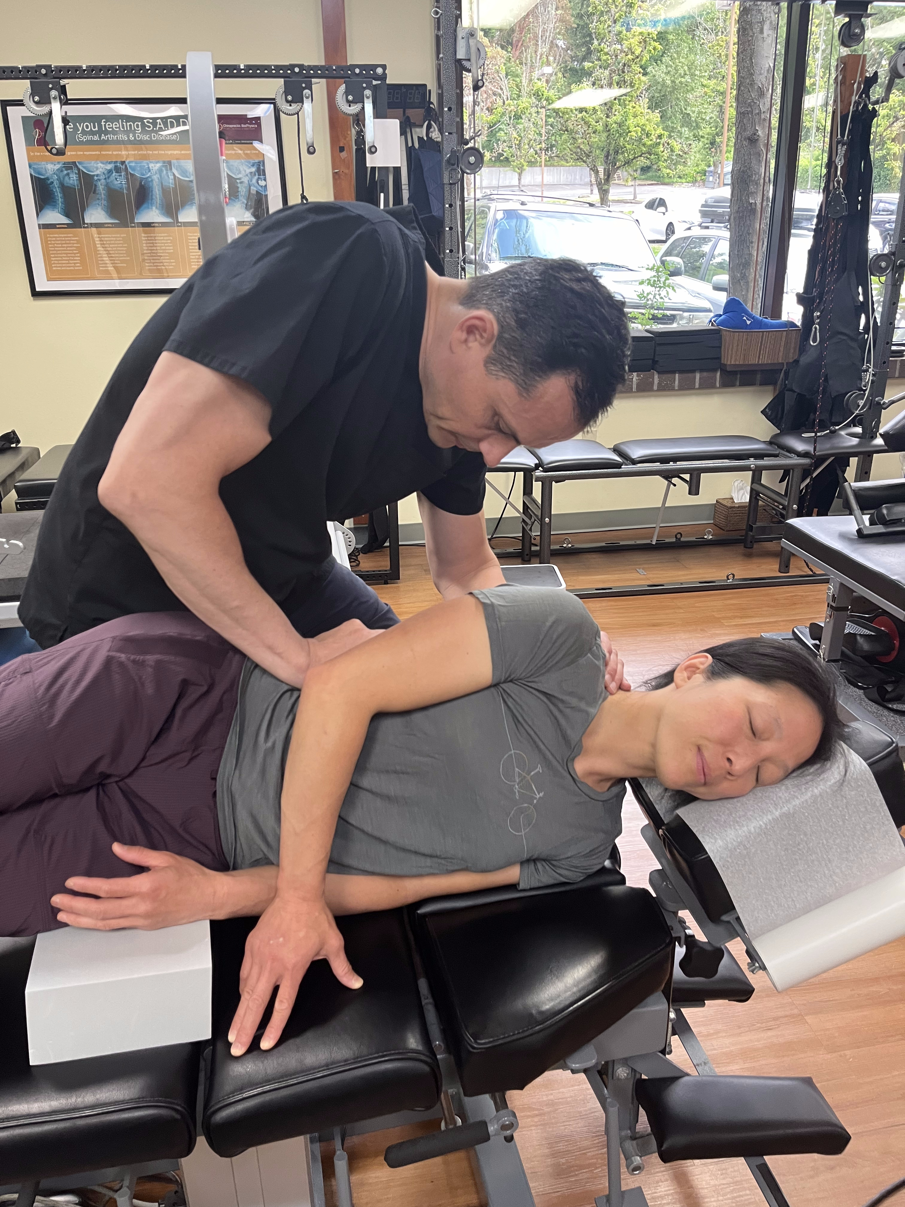 Side posture adjusting at Bellevue chiropractic clinic