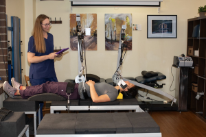 spinal decompression vs traction chiropractor patient on table